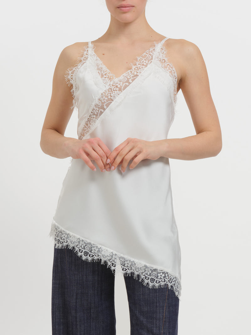 Abito asimmetrico in raso e pizzo