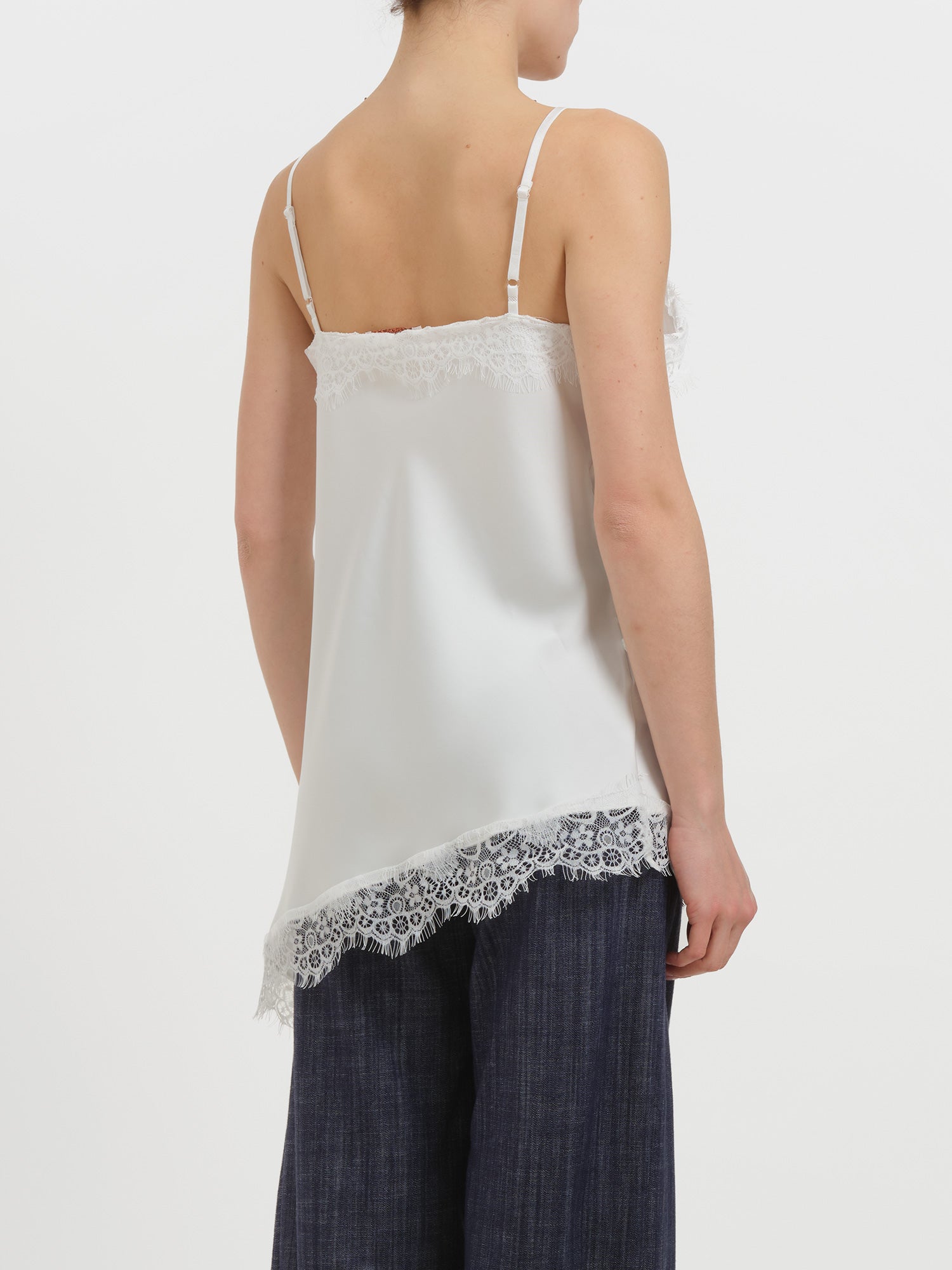 Abito asimmetrico in raso e pizzo