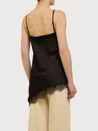 Abito asimmetrico in raso e pizzo