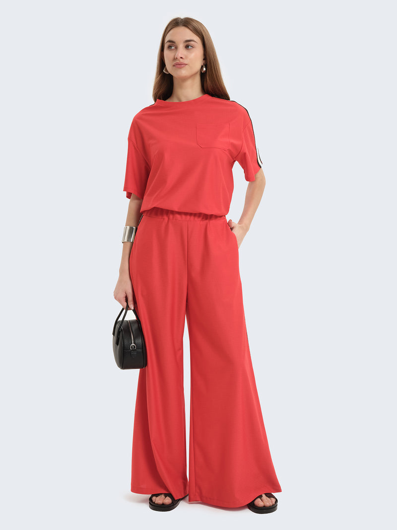 Pantaloni ampi con banda laterale