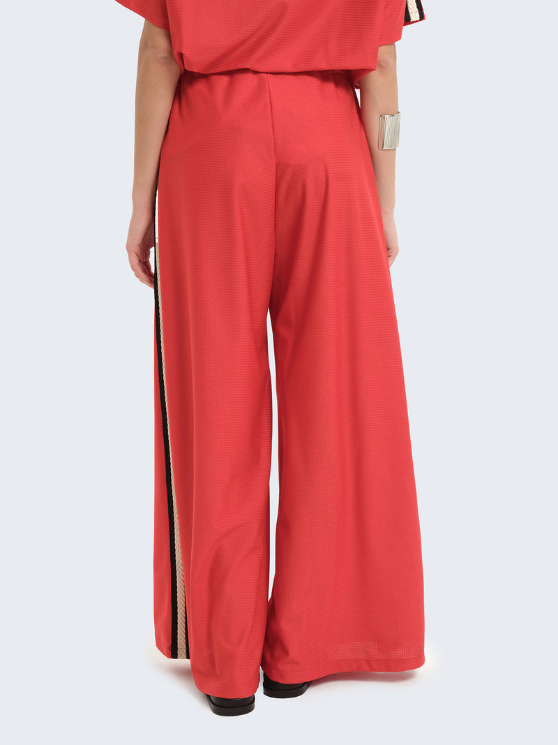 Pantaloni ampi con banda laterale