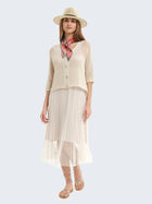 Abito con gonna in tulle e cardigan