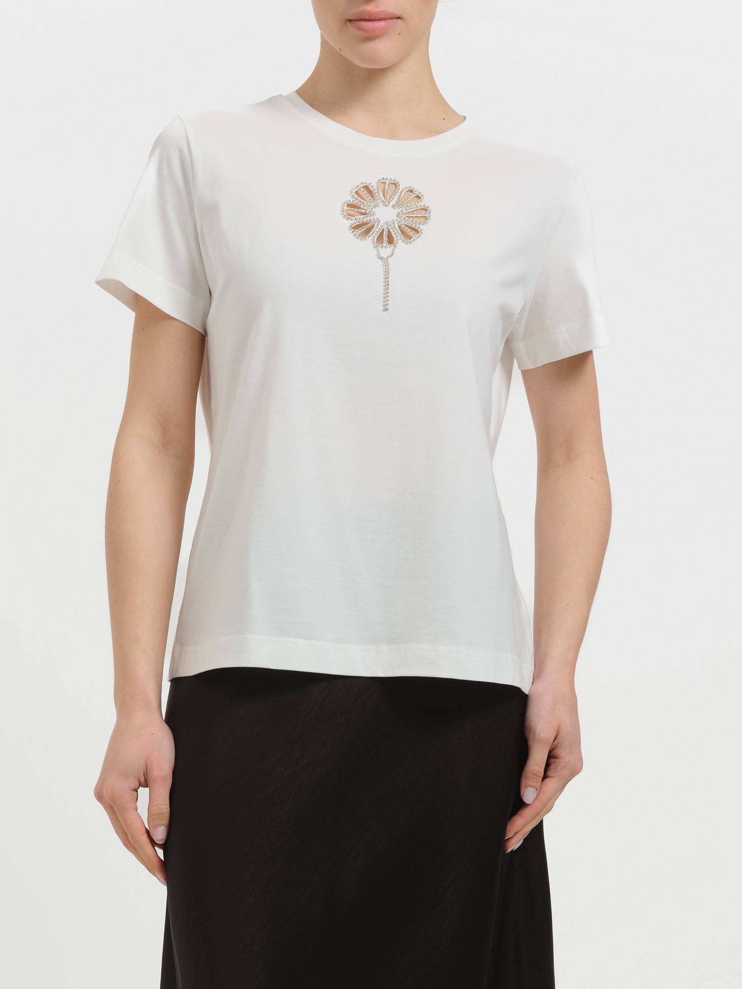 T-shirt con fiore in strass