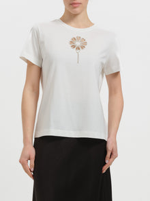 T-shirt con fiore in strass