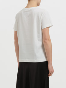 T-shirt con fiore in strass