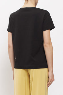 T-shirt con fiore in strass