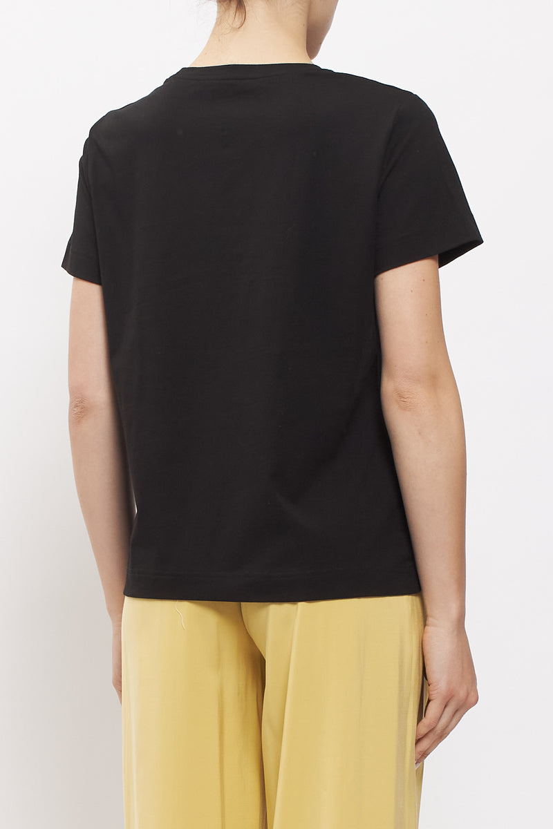 T-shirt con fiore in strass