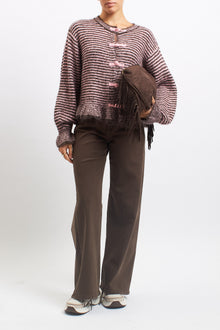 Cardigan a righe con volan