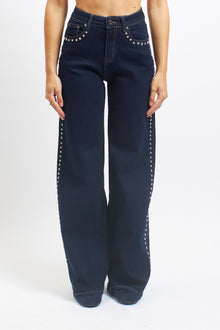 Jeans wide leg con borchie