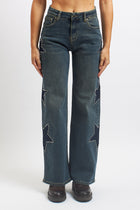 Jeans wide leg con stelle borchiate