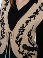 Gilet in maglia con ricami in ciniglia