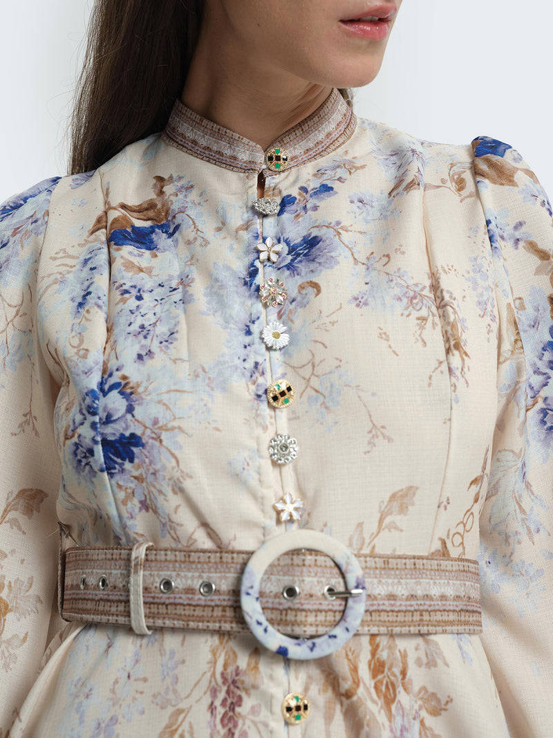 Short patterned dress with jewel buttons