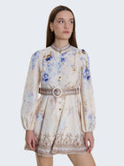 Short patterned dress with jewel buttons