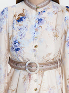 Short patterned dress with jewel buttons