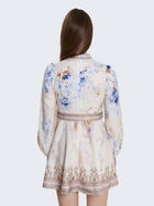 Short patterned dress with jewel buttons