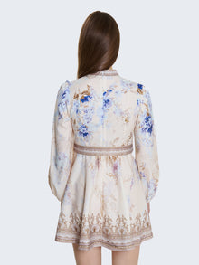 Short patterned dress with jewel buttons