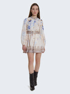 Short patterned dress with jewel buttons