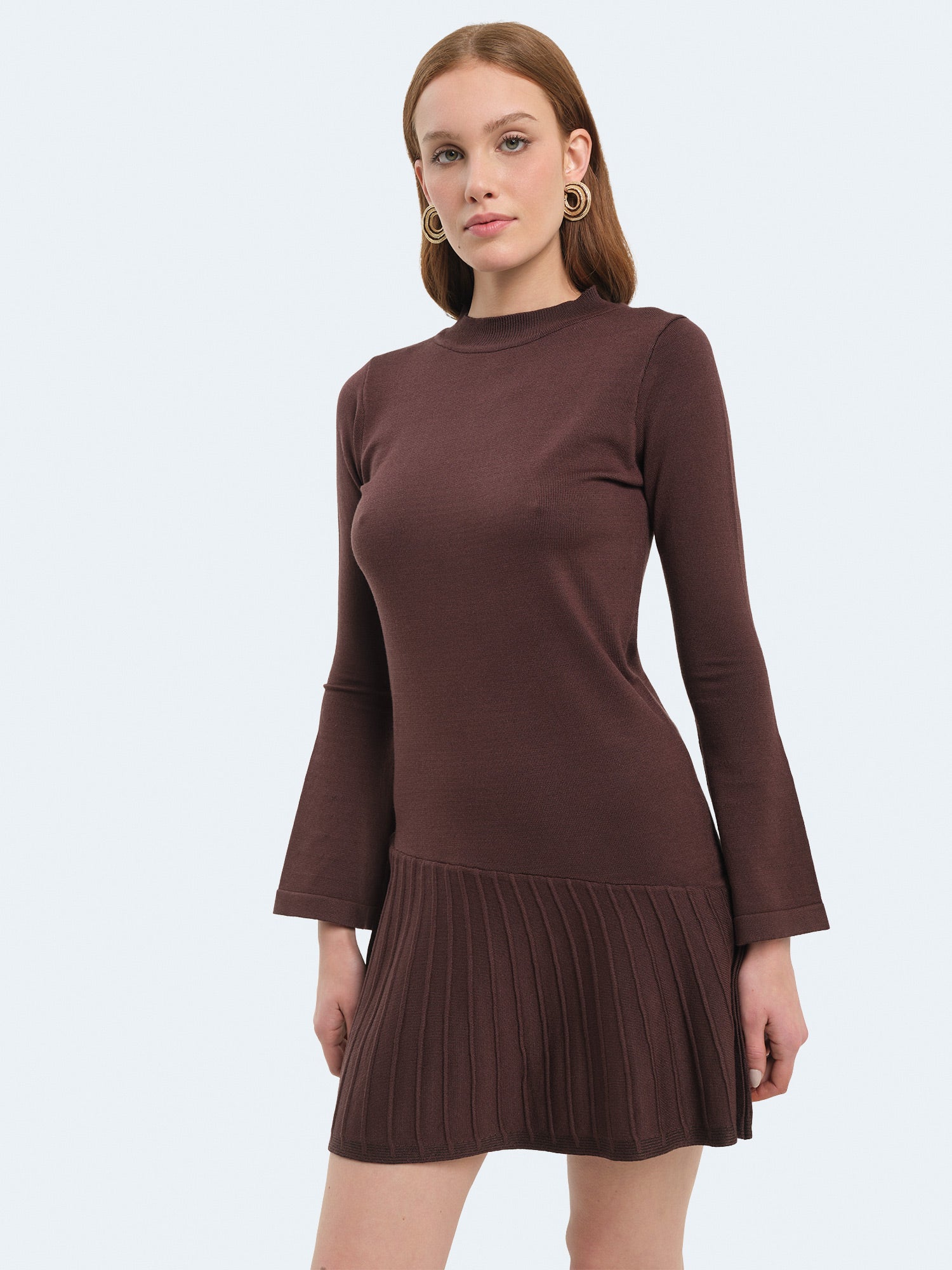 Abito in maglia con minigonna svasata