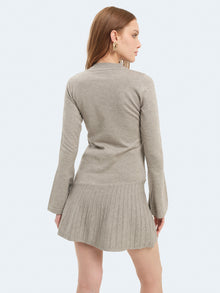 Abito in maglia con minigonna svasata