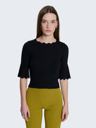 Maglia a costine e bordi a ondine