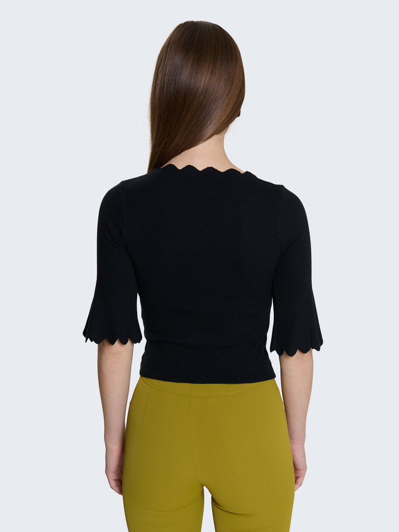 Maglia a costine e bordi a ondine