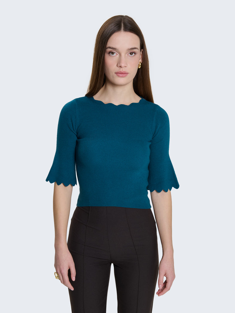 Maglia a costine e bordi a ondine