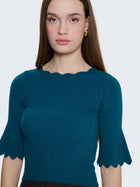 Maglia a costine e bordi a ondine