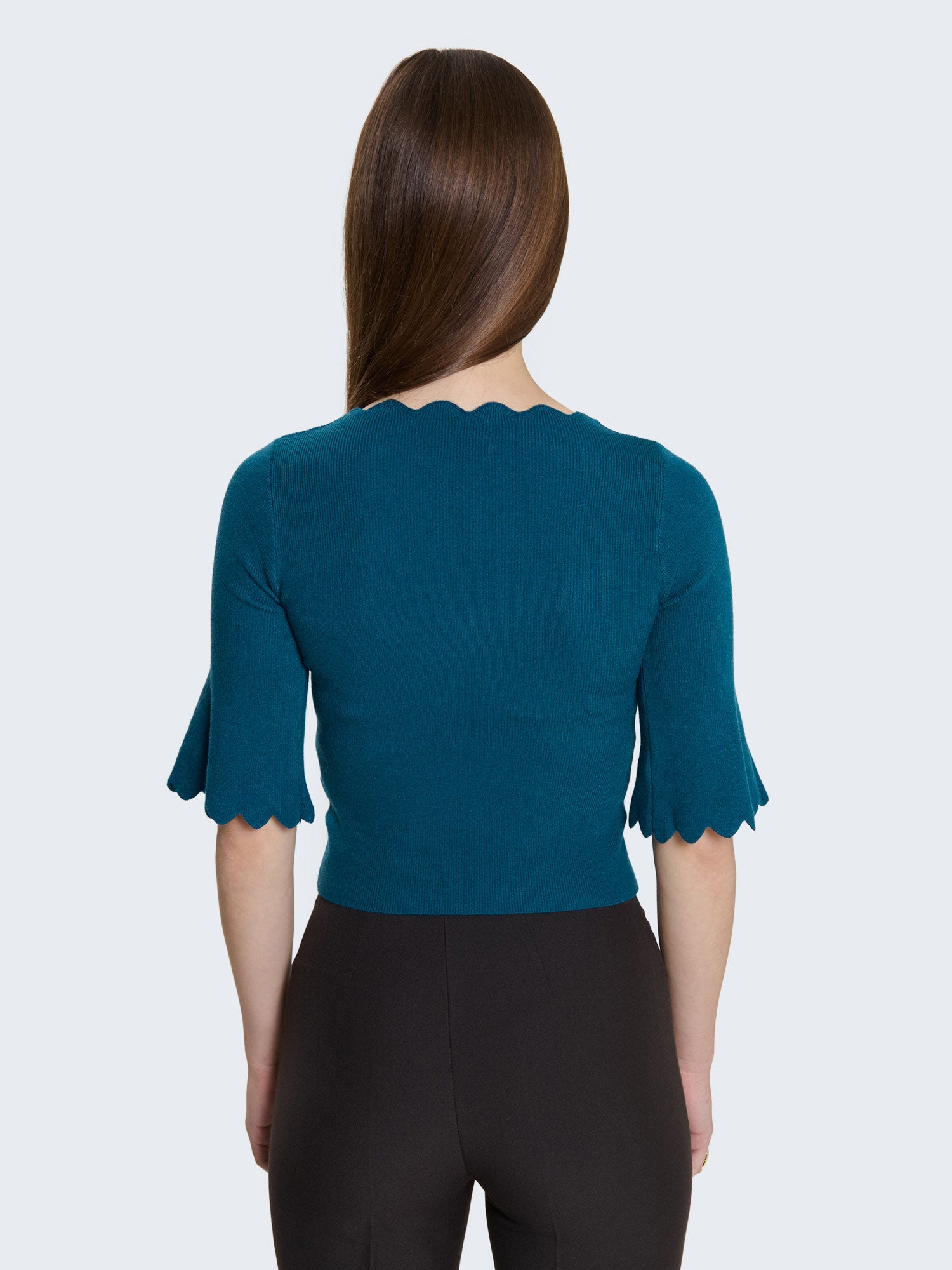 Maglia a costine e bordi a ondine