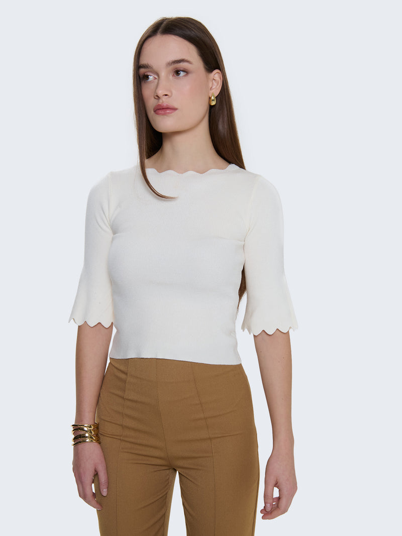 Maglia a costine e bordi a ondine