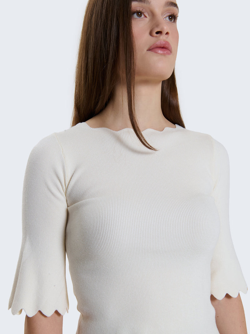 Maglia a costine e bordi a ondine