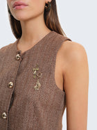 Gilet con tessuto spigato e charms