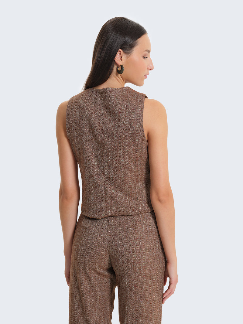 Gilet con tessuto spigato e charms