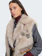 Gilet in ecopelliccia con inserti etnici e applicazioni gioiello