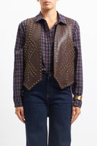 Gilet in ecopelle borchiato